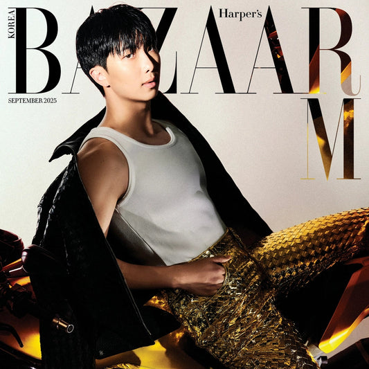 Harper's Bazaar Korea magazine cover with a person wearing a white top and gold pants.